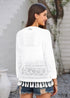 Cárdigan bohemio blanco de punto de crochet calado con borlas estilo 2024